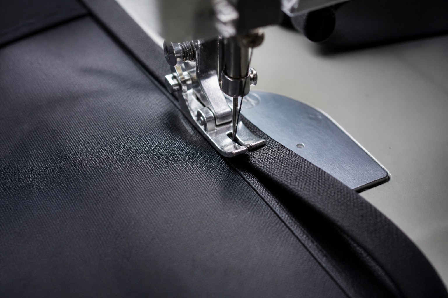 edge binding and stitch finish quality on custom suit bags
