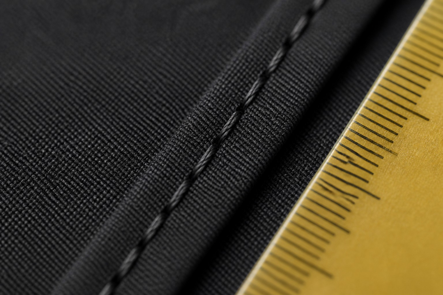 stitch level detail of custom suit bag - neat even strong seams